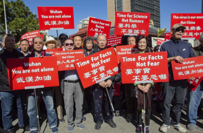 沐鸣注册地址海外华侨华人用正能量应对种族歧视